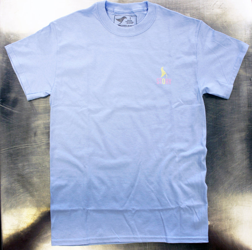 Story Queenie Crest Tee Light Blue.jpg