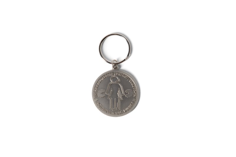 Girl Pac-Man Token Keychain Silver 3.png